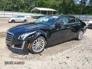 2016 Cadillac CTS Luxury Collection RWD z VIN 1G6AR5SX5G0106572, wystawiony jako Copart lot #57314745 z przebiegiem 129 830 mil mil oraz Szkoda całkowita • Salvage title. Historia ofert i sprzedaży dostępna na DreamBid. Obrazek 1.