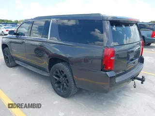 2015 Chevrolet Suburban LT z VIN 1GNSKJKC9FR245097, wystawiony jako IAAI lot #42468168 z przebiegiem 198 454 mil mil oraz . Historia ofert i sprzedaży dostępna na DreamBid. Obrazek 3.