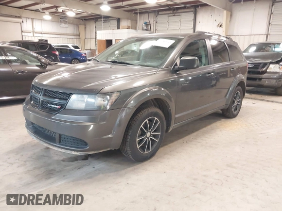 2017 Dodge Journey SE with VIN 3C4PDCAB2HT684231, listed as a IAAI auction lot 41189943 with 201,549 mi miles and . Bid and sale history available at DreamBid. Image 19.