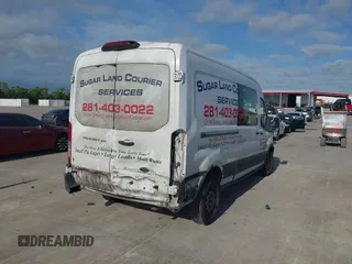 2018 Ford Transit z VIN 1FTYR2CM3JKA19554, wystawiony jako IAAI lot #42058523 z przebiegiem 372 734 mil mil oraz . Historia ofert i sprzedaży dostępna na DreamBid. Obrazek 6.
