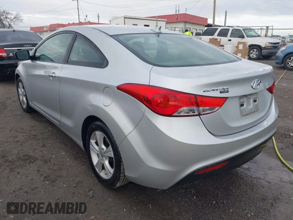 2013 Hyundai Elantra Coupe SE with VIN KMHDH6AE8DU011104, listed as a IAAI auction lot 41588963 with 112,726 mi miles. Bid and sale history available at carsss.com. Image 3.