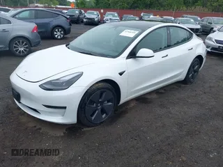 2023 Tesla Model 3 z VIN 5YJ3E1EA6PF570876, wystawiony jako IAAI lot #42366310 z przebiegiem 13 005 mil mil oraz . Historia ofert i sprzedaży dostępna na DreamBid. Obrazek 19.