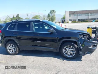 2017 Jeep Cherokee Latitude with VIN 1C4PJMCB3HW605381, listed as a IAAI auction lot 42217633 with 115,055 mi miles and . Bid and sale history available at DreamBid. Image 13.
