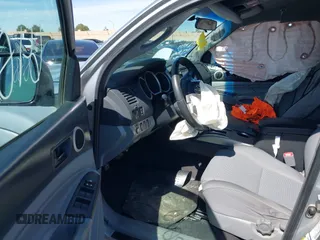 2014 Toyota Tacoma PreRunner with VIN 5TFJU4GN3EX051198, listed as a IAAI auction lot 41764088 with 126,259 mi miles. Bid and sale history available at carsss.com. Image 5.