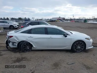 2019 Toyota Avalon XLE with VIN 4T1BZ1FB5KU014903, listed as a IAAI auction lot 41388692 with 100,599 mi miles. Bid and sale history available at carsss.com. Image 13.