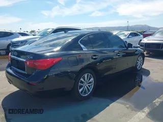 2014 Infiniti Q50 Premium with VIN JN1BV7AP0EM687787, listed as a IAAI auction lot 42084288 with 109,499 mi miles and . Bid and sale history available at carsss.com. Image 4.