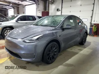 2023 Tesla Model Y Long Range z VIN 7SAYGDEE8PF814874, wystawiony jako Copart lot #56546365 z przebiegiem 20 919 mil mil oraz Szkody całkowita. Historia ofert i sprzedaży dostępna na DreamBid. Obrazek 1.