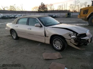 2002 Lincoln Town Car Cartier with VIN 1LNHM83W62Y618719, listed as a Copart auction lot 88722925 with 0 mi miles and Salvage Title. Bid and sale history available at carsss.com. Image 4.