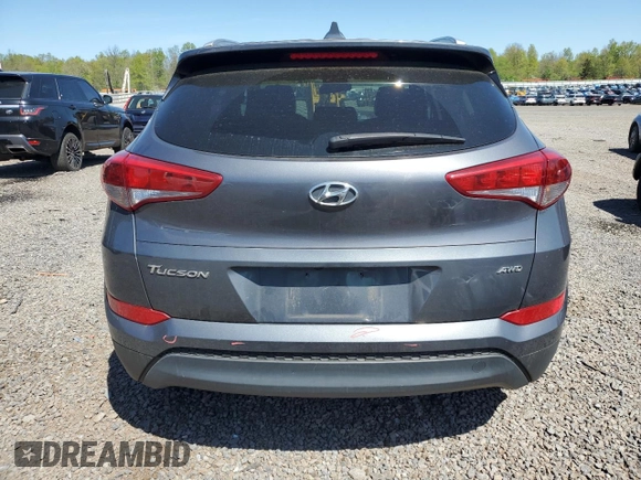 2018 Hyundai Tucson SEL with VIN KM8J3CA41JU784239, listed as a Copart auction lot 54331525 with 63,121 mi miles and Salvage title. Bid and sale history available at DreamBid. Image 6.