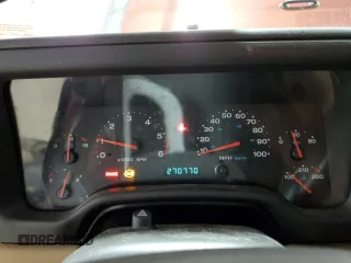 2002 Jeep Wrangler Sahara z VIN 1J4FA59S62P751858, wystawiony jako Copart lot #56638165 z przebiegiem 270 770 mil mil oraz Szkoda całkowita • Salvage title. Historia ofert i sprzedaży dostępna na DreamBid. Obrazek 9.