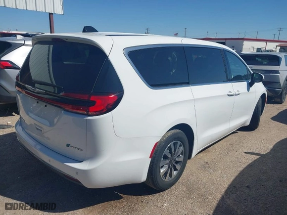 2023 Chrysler Pacifica Hybrid Touring L with VIN 2C4RC1L74PR579720, listed as a IAAI auction lot 41762445 with 38,095 mi miles. Bid and sale history available at carsss.com. Image 4.