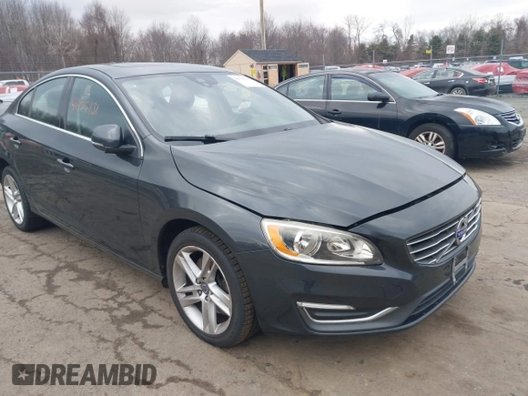 2015 Volvo S60 T5 Platinum with VIN YV1612TDXF1317203, listed as a IAAI auction lot 41715131 with 142,632 mi miles. Bid and sale history available at carsss.com. Image 1.