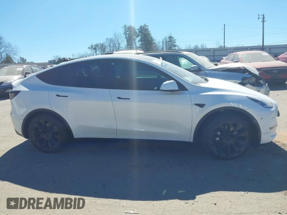 2021 Tesla Model Y Long Range with VIN 5YJYGDEE8MF125104, listed as a IAAI auction lot 41698065 with 25,177 mi miles and . Bid and sale history available at DreamBid. Image 12.