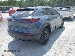 2024 Mazda CX-30 S Preferred with VIN 3MVDMBCM5RM648894, listed as a IAAI auction lot 42119860 with 23,857 mi miles and . Bid and sale history available at DreamBid. Image 4.