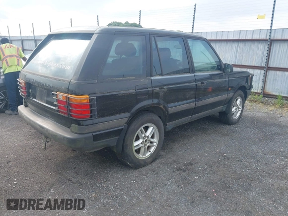 1999 Land Rover Range Rover z VIN SALPV1440XA412936, wystawiony jako IAAI lot #42271704 z przebiegiem 156 881 mil mil oraz . Historia ofert i sprzedaży dostępna na DreamBid. Obrazek 4.