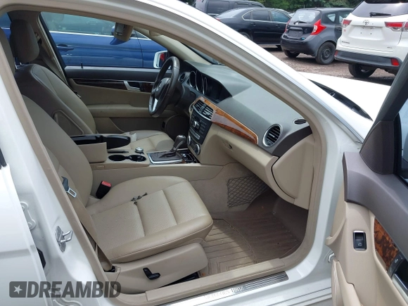 2014 Mercedes-Benz C 250 Sport with VIN WDDGF4HB8EG198230, listed as a IAAI auction lot 42519658 with 152,934 mi miles and . Bid and sale history available at DreamBid. Image 5.