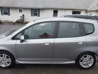 2007 Honda Fit Sport z VIN JHMGD38647S049521, wystawiony jako IAAI lot #42289057 z przebiegiem 130 434 mil mil oraz . Historia ofert i sprzedaży dostępna na DreamBid. Obrazek 14.