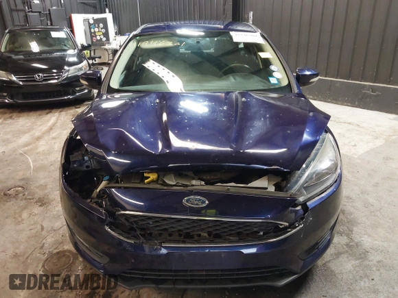 2016 Ford Focus SE with VIN 1FADP3K27GL357008, listed as a IAAI auction lot 41946301 with 101,429 mi miles and . Bid and sale history available at carsss.com. Image 6.