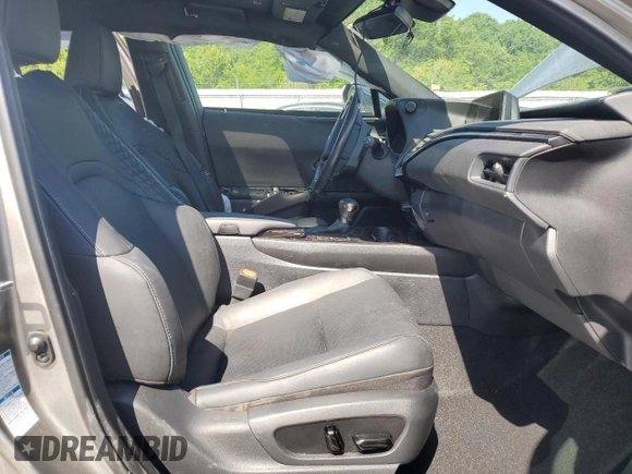 2022 Lexus UX 250h with VIN JTHP9JBH8N2060065, listed as a Copart auction lot 58173725 with 50,990 mi miles and Salvage title. Bid and sale history available at DreamBid. Image 7.