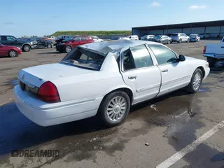 2008 Mercury Grand Marquis LS z VIN 2MEFM75V68X647087, wystawiony jako IAAI lot #41936416 z przebiegiem 263 636 mil mil oraz . Historia ofert i sprzedaży dostępna na DreamBid. Obrazek 4.