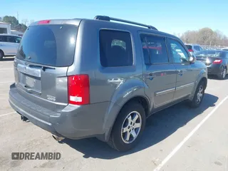 2010 Honda Pilot Touring with VIN 5FNYF4H94AB031167, listed as a IAAI auction lot 41800738 with 184,126 mi miles and . Bid and sale history available at carsss.com. Image 4.