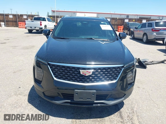 2024 Cadillac XT4 AWD Premium Luxury z VIN 1GYFZDR44RF144801, wystawiony jako IAAI lot #42646613 z przebiegiem 37 358 mil mil oraz . Historia ofert i sprzedaży dostępna na DreamBid. Obrazek 13.