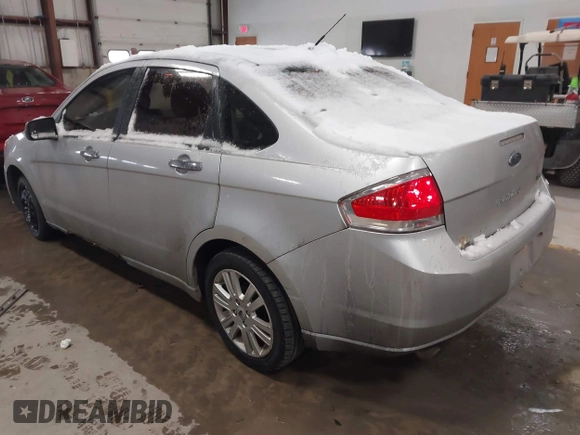 2010 Ford Focus SEL with VIN 1FAHP3HN8AW122237, listed as a IAAI auction lot 41203994 with 117,440 mi miles. Bid and sale history available at carsss.com. Image 3.