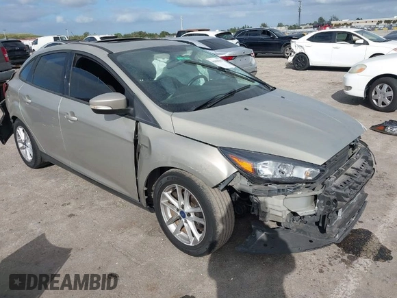 2015 Ford Focus SE with VIN 1FADP3F29FL292655, listed as a IAAI auction lot 41090945 with 106,060 mi miles. Bid and sale history available at carsss.com. Image 1.