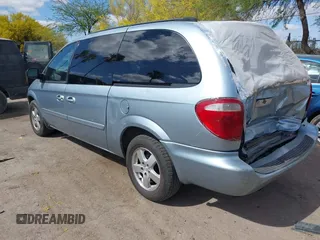2005 Dodge Caravan SXT with VIN 2D4GP44L75R193138, listed as a IAAI auction lot 42073429 with 206,915 mi miles and . Bid and sale history available at DreamBid. Image 3.