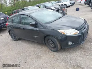 2012 Ford Focus SE with VIN 1FAHP3K27CL455211, listed as a IAAI auction lot 42048868 with 164,474 mi miles. Bid and sale history available at carsss.com. Image 1.