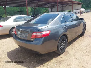 2009 Toyota Camry with VIN 4T1BE46K19U822477, listed as a IAAI auction lot 42052700 with 218,509 mi miles. Bid and sale history available at carsss.com. Image 4.