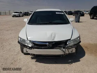 2009 Honda Civic Sdn LX with VIN 2HGFA16579H304372, listed as a Copart auction lot 53100595 with 148,273 mi miles and Salvage Title. Bid and sale history available at carsss.com. Image 5.