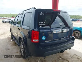 2011 Honda Pilot Touring z VIN 5FNYF3H94BB032105, wystawiony jako IAAI lot #42435522 z przebiegiem 247 899 mil mil oraz . Historia ofert i sprzedaży dostępna na DreamBid. Obrazek 3.