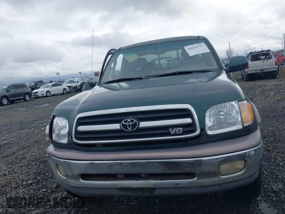 2000 Toyota Tundra Limited with VIN 5TBBT4812YS031675, listed as a IAAI auction lot 41626727 with 257,195 mi miles. Bid and sale history available at carsss.com. Image 12.