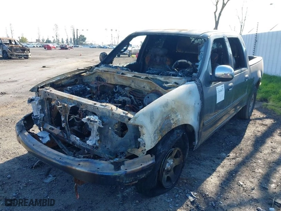 2002 Ford F-150 XLT with VIN 1FTRW07L12KA22442, listed as a IAAI auction lot 41448471 with 1 mi miles. Bid and sale history available at carsss.com. Image 2.