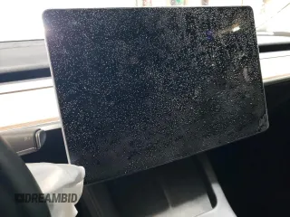 2023 Tesla Model Y Long Range z VIN 7SAYGAEE3PF968231, wystawiony jako Copart lot #45811385 z przebiegiem Nie podano mil oraz Szkoda całkowita • Salvage title. Historia ofert i sprzedaży dostępna na DreamBid. Obrazek 9.