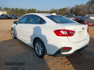 2017 Chevrolet Cruze LT z VIN 1G1BE5SM0H7235078, wystawiony jako IAAI lot #41734625 z przebiegiem 140 548 mil mil oraz . Historia ofert i sprzedaży dostępna na DreamBid. Obrazek 3.