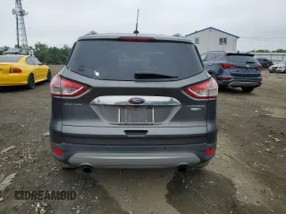 2016 Ford Escape Titanium with VIN 1FMCU9J95GUA58624, listed as a Copart auction lot 59915305 with 102,061 mi miles and Salvage title. Bid and sale history available at DreamBid. Image 6.