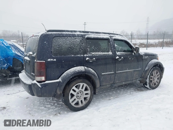 2011 Dodge Nitro Heat with VIN 1D4PU4GK0BW576840, listed as a IAAI auction lot 41318203 with 91,118 mi miles and . Bid and sale history available at carsss.com. Image 4.