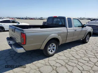 2004 Nissan Frontier XE with VIN 1N6DD26T14C412707, listed as a Copart auction lot 56789905 with 288,721 mi miles and Salvage title. Bid and sale history available at DreamBid. Image 3.