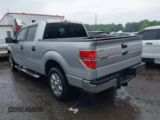 2013 Ford F-150 XL with VIN 1FTFW1CF5DKF63831, listed as a IAAI auction lot 39559854 with 125,721 mi miles and . Bid and sale history available at carsss.com. Image 3.
