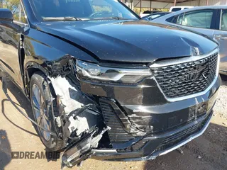 2025 Cadillac XT6 FWD Premium Luxury with VIN 1GYKPCRS1SZ118772, listed as a IAAI auction lot 41048190 with 131 mi miles. Bid and sale history available at carsss.com. Image 6.