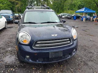 2015 MINI Countryman z VIN WMWZB3C59FWR43890, wystawiony jako IAAI lot #42372407 z przebiegiem 131 884 mil mil oraz . Historia ofert i sprzedaży dostępna na DreamBid. Obrazek 6.