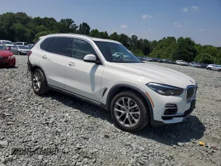 2019 BMW X5 xDrive40i with VIN 5UXCR6C5XKLL61071, listed as a Copart auction lot 60158945 with 67,631 mi miles and Salvage title. Bid and sale history available at DreamBid. Image 4.
