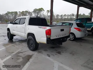2016 Toyota Tacoma SR with VIN 5TFCZ5AN3GX039919, listed as a IAAI auction lot 41607382 with 107,703 mi miles. Bid and sale history available at carsss.com. Image 3.