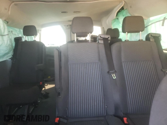 2016 Ford Transit Wagon XL with VIN 1FMZK1YM9GKB28861, listed as a Copart auction lot 77015814 with 111,384 mi miles and Salvage Title. Bid and sale history available at carsss.com. Image 10.