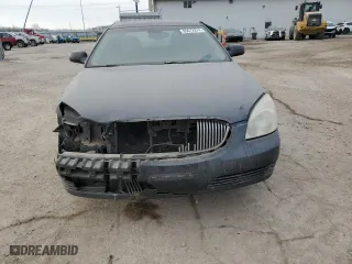 2009 Buick Lucerne CX with VIN 1G4HP57M69U121282, listed as a Copart auction lot 85672874 with 243,010 mi miles and Salvage Title. Bid and sale history available at carsss.com. Image 5.