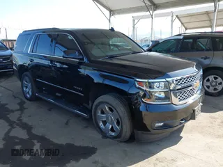 2016 Chevrolet Tahoe LT with VIN 1GNSKBKC5GR481043, listed as a IAAI auction lot 41968681 with 156,172 mi miles and . Bid and sale history available at DreamBid. Image 1.