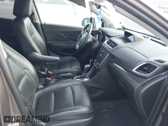 2014 Buick Encore Leather with VIN KL4CJCSB3EB739931, listed as a IAAI auction lot 41891726 with 113,473 mi miles and . Bid and sale history available at carsss.com. Image 5.