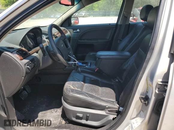 2009 Ford Taurus Limited z VIN 1FAHP25W09G118860, wystawiony jako Copart lot #54604575 z przebiegiem 212 886 mil mil oraz Szkoda całkowita • Salvage title. Historia ofert i sprzedaży dostępna na DreamBid. Obrazek 7.